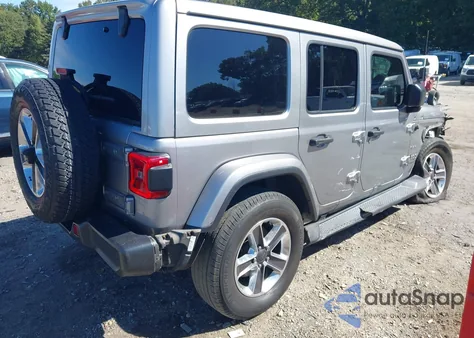 2020 Jeep Wrangler Unlimited Sahara z USA, uszkodzony, nr VIN 1C4HJXEN7LW149651